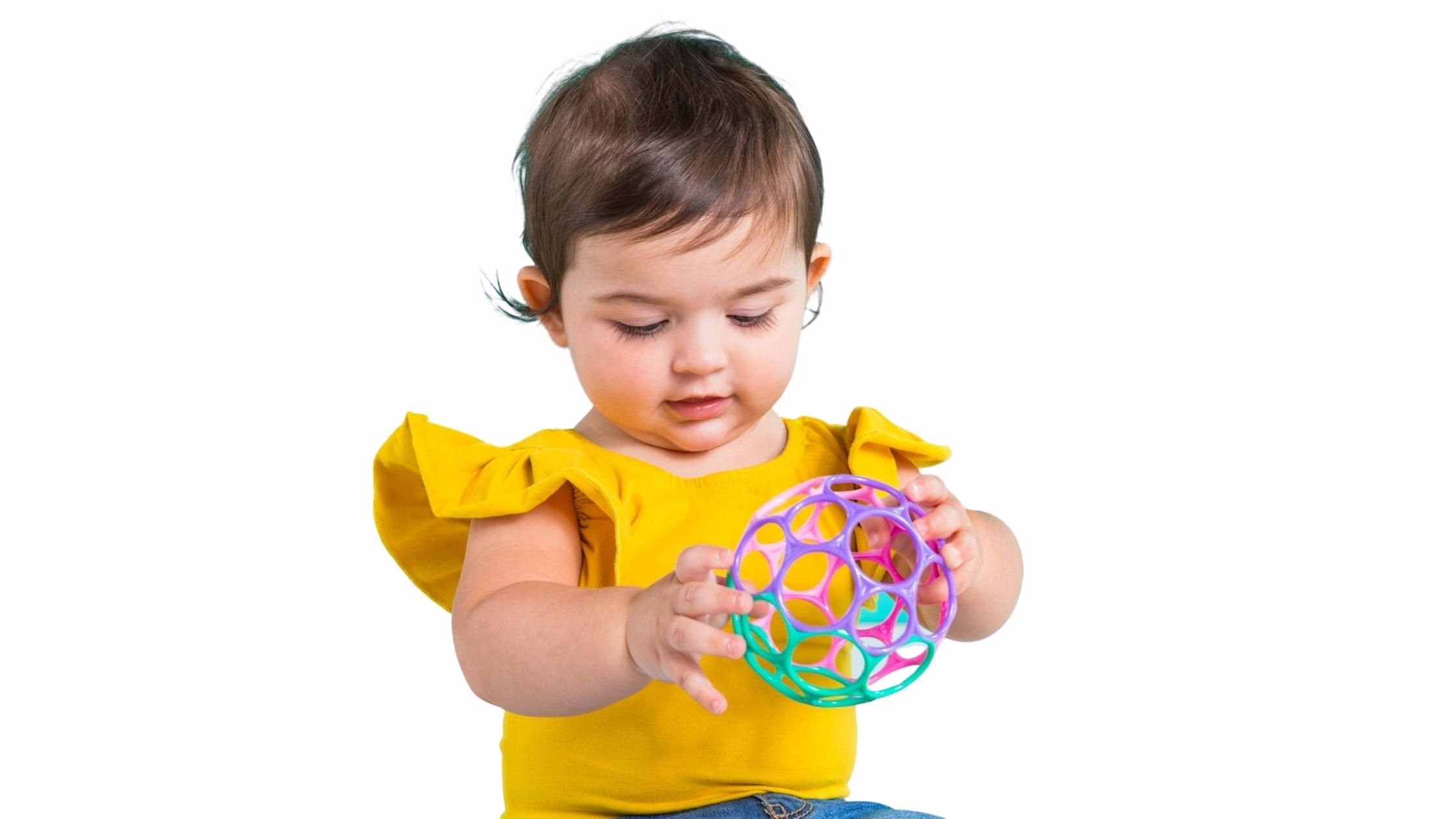 baby playing with grasping ball